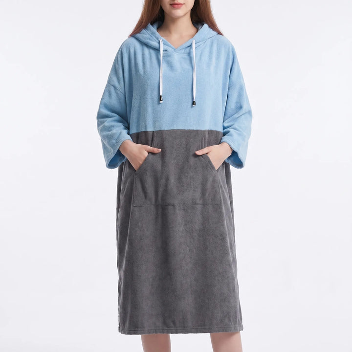 Oversized unisex surf poncho, ideal for watersports changing, beach, and post-swim warmth. Quick-dry fabric.