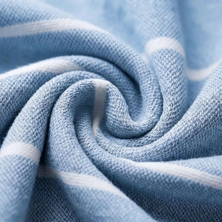 Soft, quick-dry hooded changing poncho. Ideal beach cover-up for post-swim comfort & warmth.