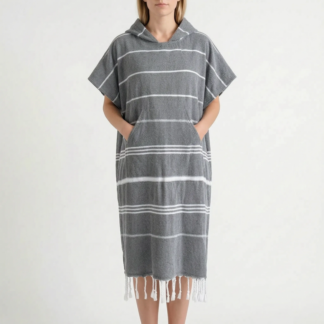 Compact & quick-dry unisex hooded changing poncho, perfect travel gear for beach trips & watersports.