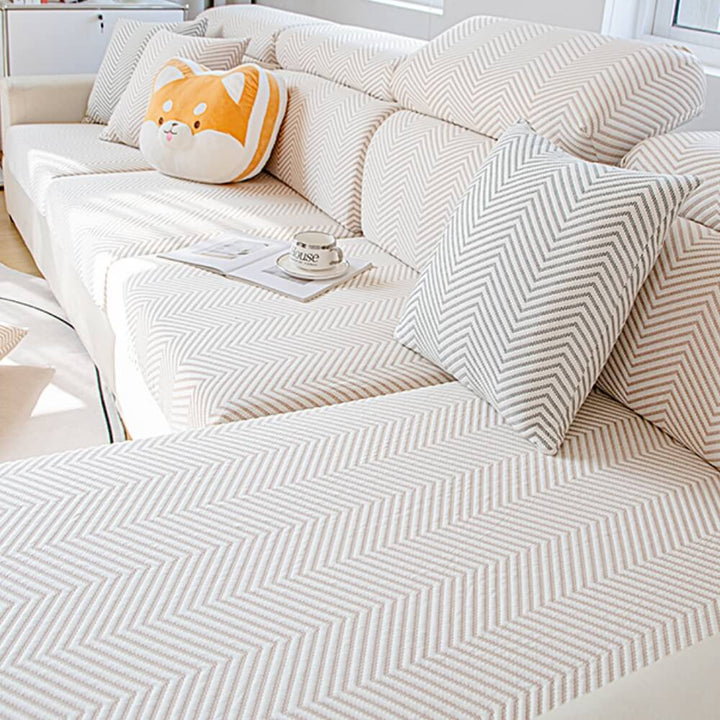 Lifestyle image of a family enjoying a sofa with a cool and comfortable ice silk stretch cover.