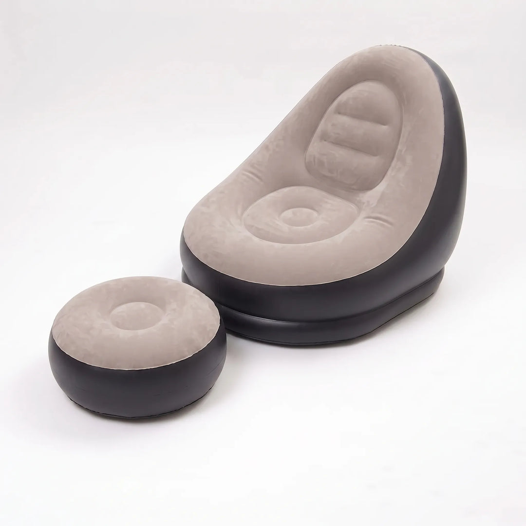 Durable inflatable lounge chair & ottoman set for backyard, garden, and outdoor patio relaxation.