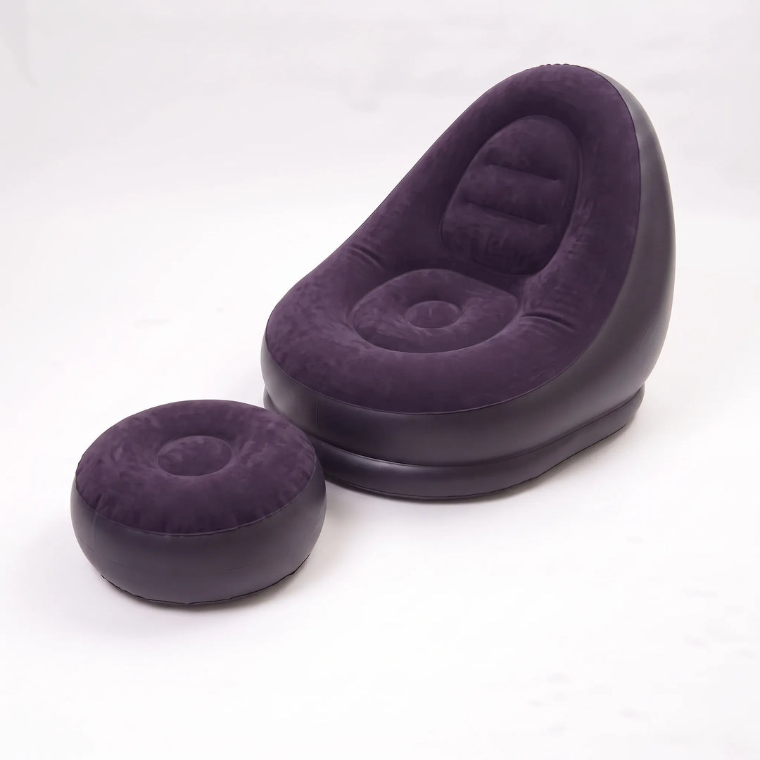Versatile inflatable lounge chair with footrest, great for indoor guest seating or comfortable relaxation.