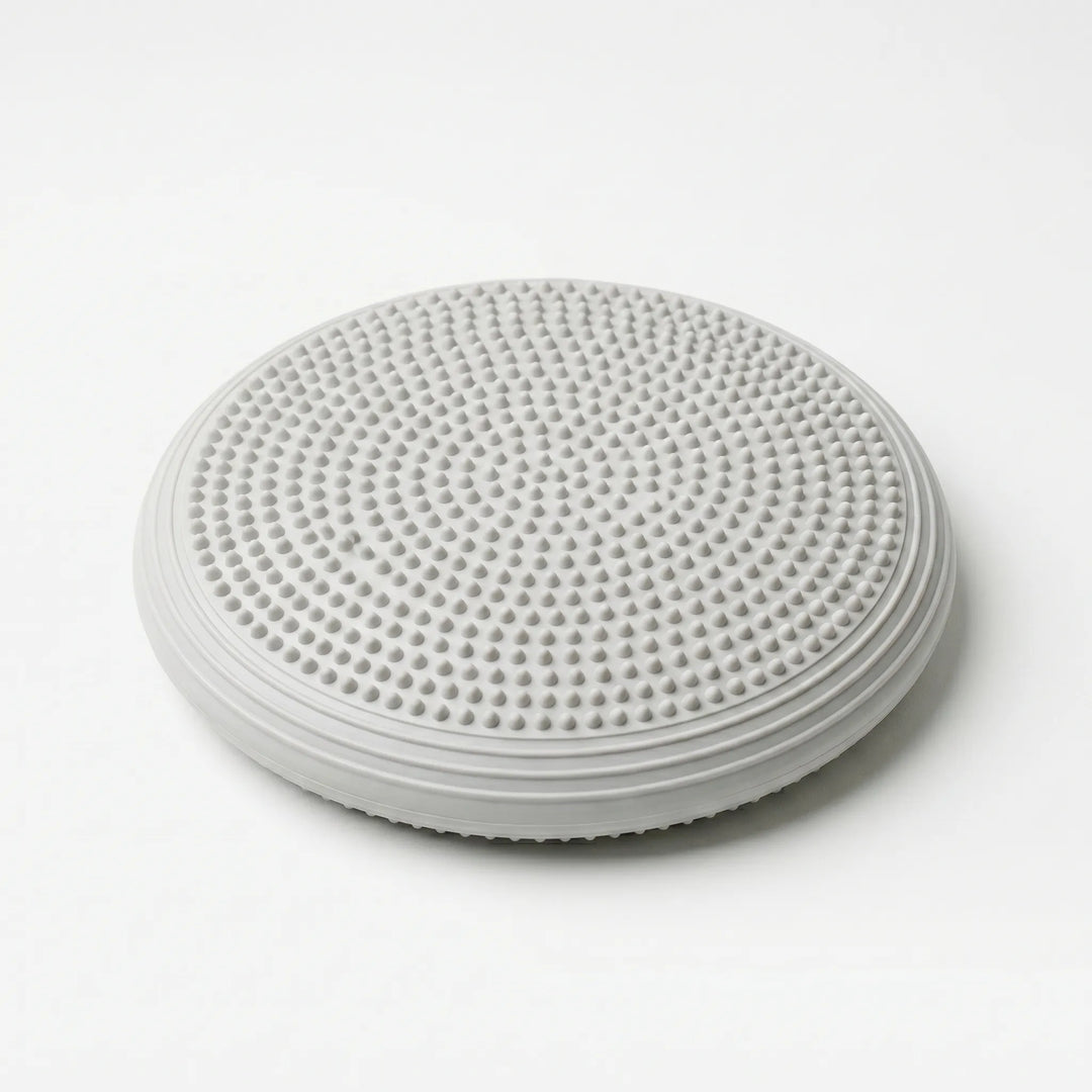 Inflatable balance cushion for active sitting, yoga, pilates, & fitness. Improves stability & posture.