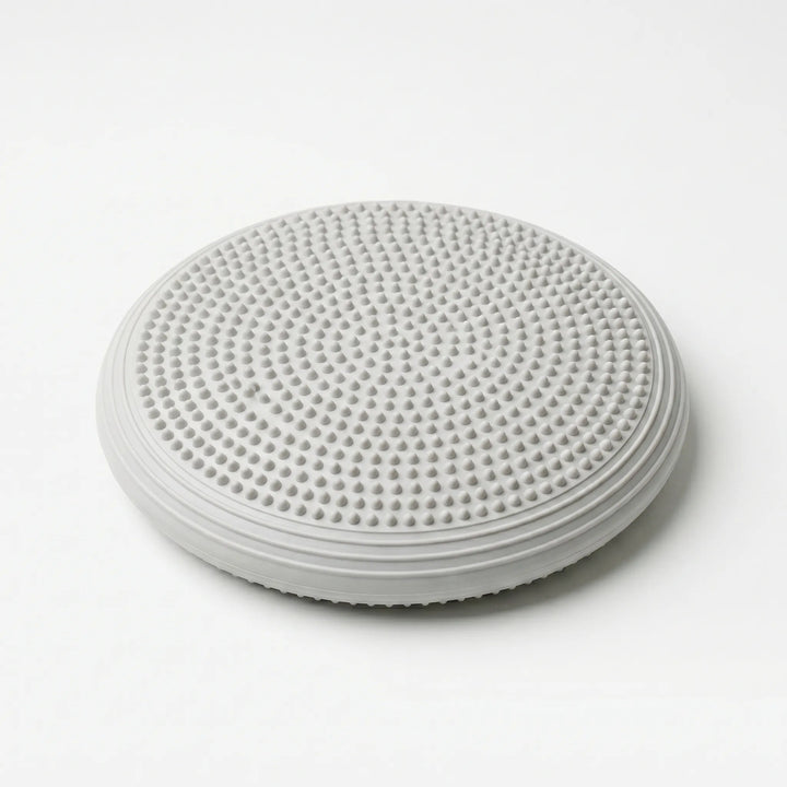 Inflatable balance cushion for active sitting, yoga, pilates, & fitness. Improves stability & posture.