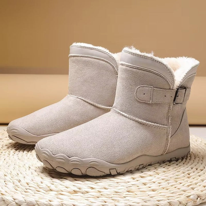 Pair of unisex warm insulated barefoot winter boots, ideal for cold weather comfort.