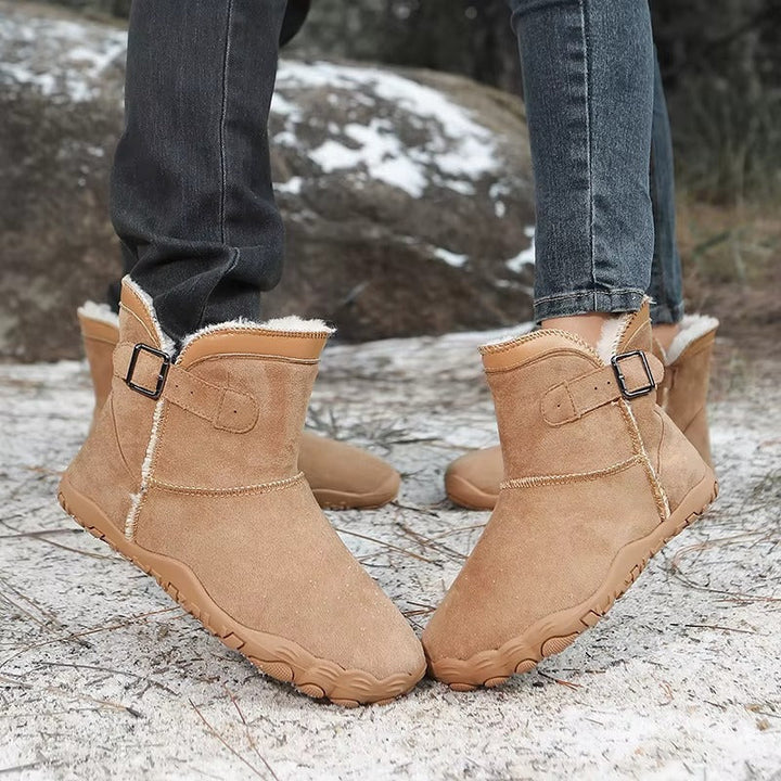 Close-up of warm insulation on unisex barefoot winter boots, ideal for cold weather.