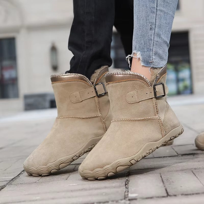 Wide toe box design on unisex warm insulated barefoot winter boots for natural comfort.