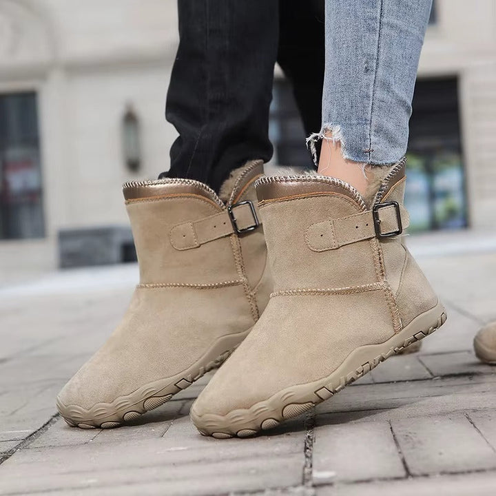 Wide toe box design on unisex warm insulated barefoot winter boots for natural comfort.
