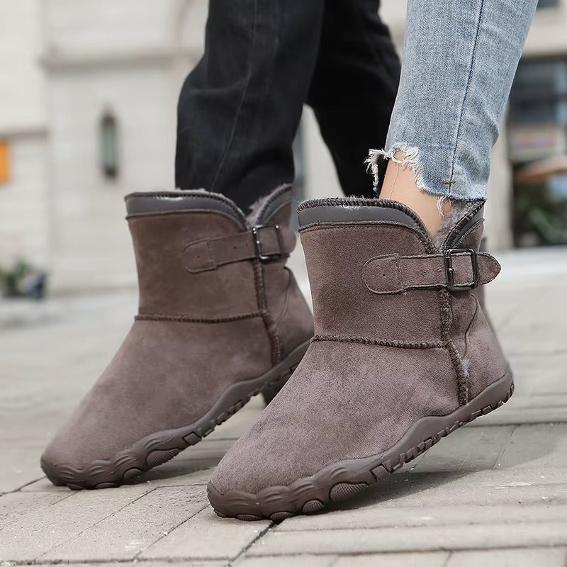 Unisex barefoot winter boots in use, offering natural walking comfort in cold weather.