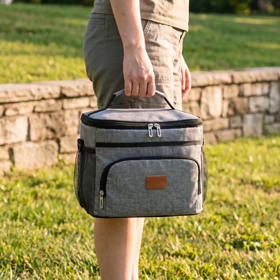 Unisex insulated cooler bag for lunch, picnics, & travel. Foldable & soft for easy carrying.