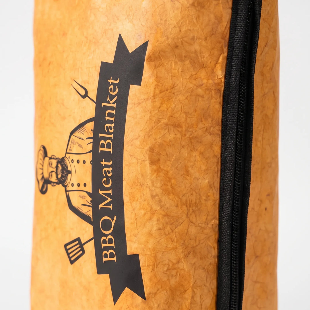 Grey Tyvek insulated meat resting bag for large BBQ roasts. Durable thermal carrier for picnics & outdoor cooking.