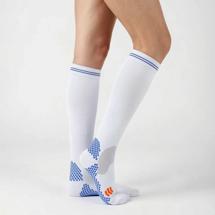 Premium activewear knee-high compression socks, unisex for fitness, running, and peak athletic performance.