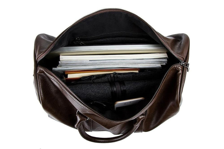 Durable unisex black faux leather travel bag, large capacity for gym, weekend or carry-on.