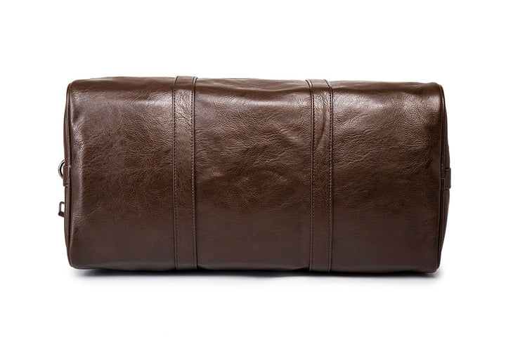 Unisex large black faux leather travel duffel, ideal as gym bag or weekend carry-on luggage.
