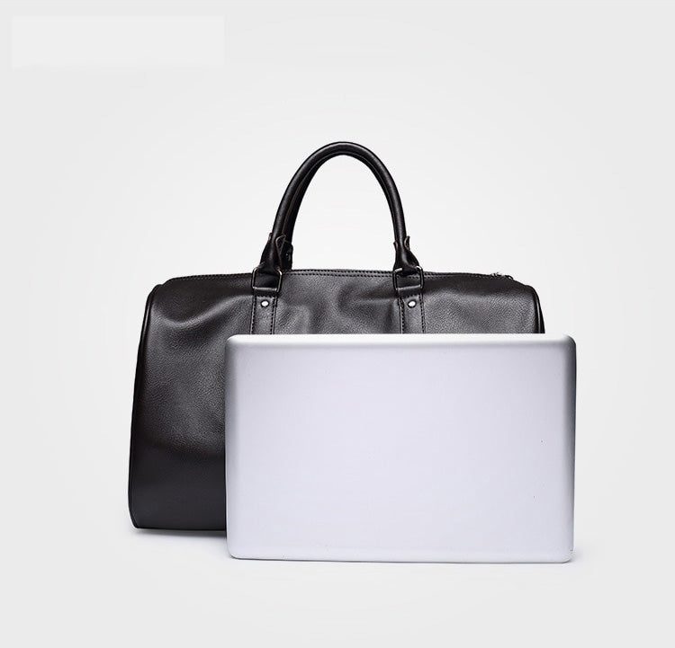 Spacious brown faux leather travel duffel, a versatile carry-on luggage & weekend bag.
