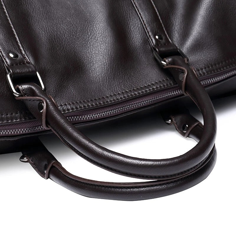 Elegant brown faux leather travel duffel, a large carry-on bag suitable for any traveler.