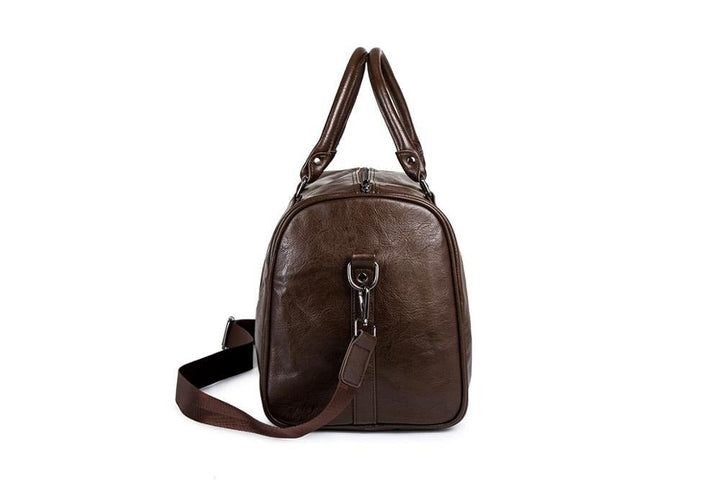 Chic brown unisex travel duffel, a roomy faux leather carry-on for stylish journeys.