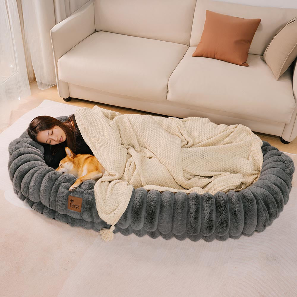 Orthopedic large dog bed with a donut shape, perfect for deep sleep & pet comfort.