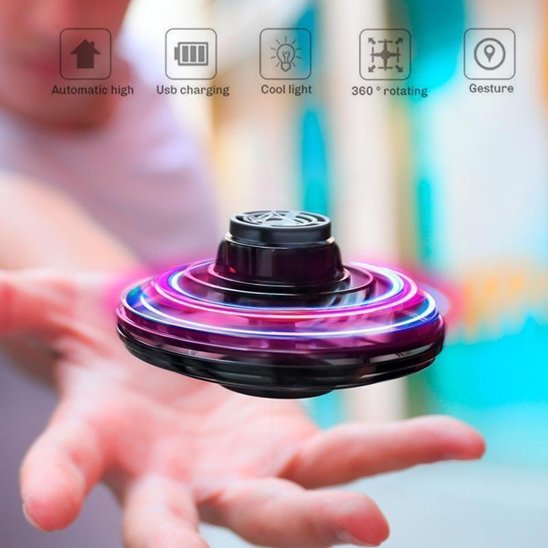 Unisex LED Mini Drone Flying Toy Helicopter with bright lights, perfect interactive fun for kids indoors & outdoors.