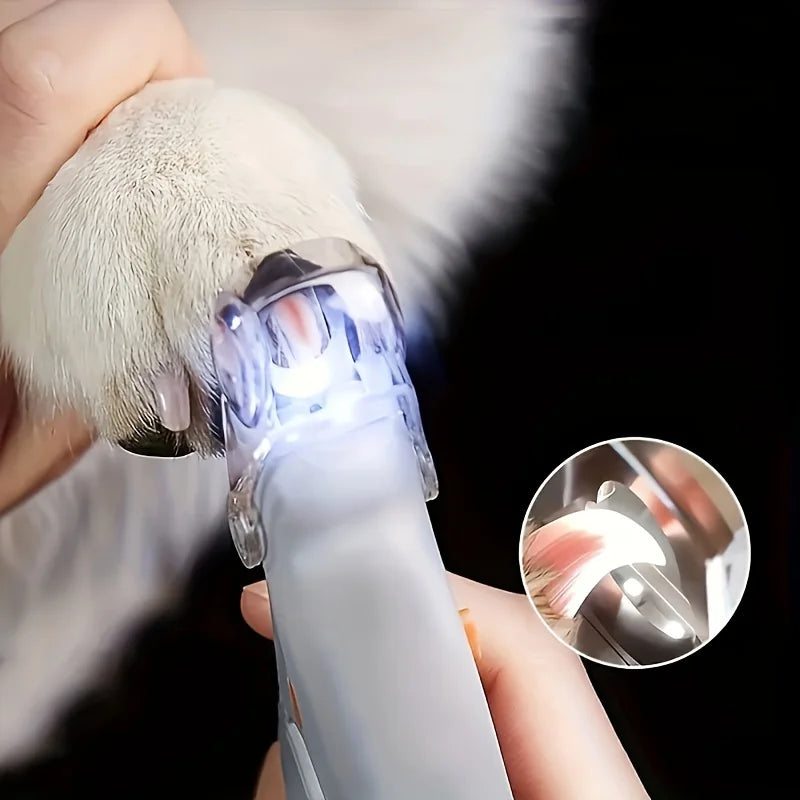 Close-up of LED pet nail clippers for safe trimming, showing bright light and sharp stainless steel