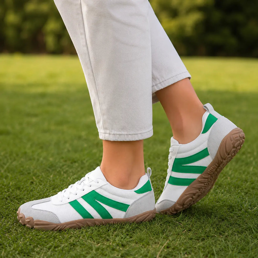Breathable barefoot hiking shoes with a wide fit and lightweight construction for natural walking.