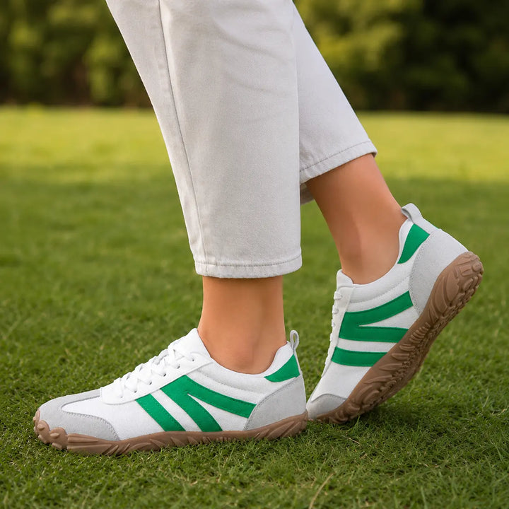 Breathable barefoot hiking shoes with a wide fit and lightweight construction for natural walking.
