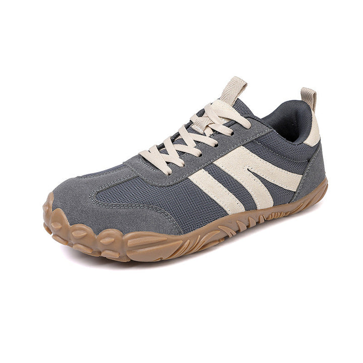 Lightweight unisex hiking footwear with a wide fit for barefoot feel and trail performance.