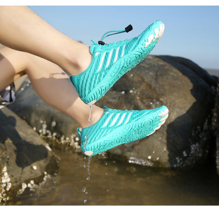 Close-up of flexible sole on minimalist barefoot shoes, aiding natural foot function.