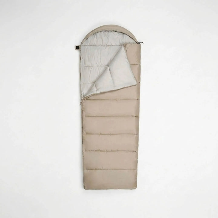 Compact & lightweight green envelope sleeping bag, ideal for easy packing on camping and hiking trips.