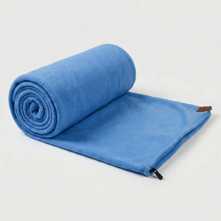 Compact roll-up fleece sleeping bag for backpackers. Lightweight & portable outdoor gear for travel.