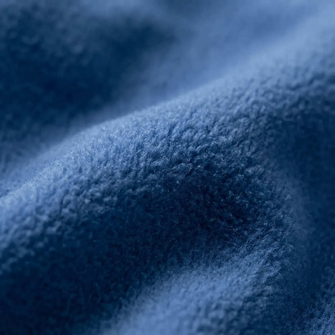 Compact, lightweight fleece sleeping bag liner for easy packing. Essential travel and backpacking camping gear.