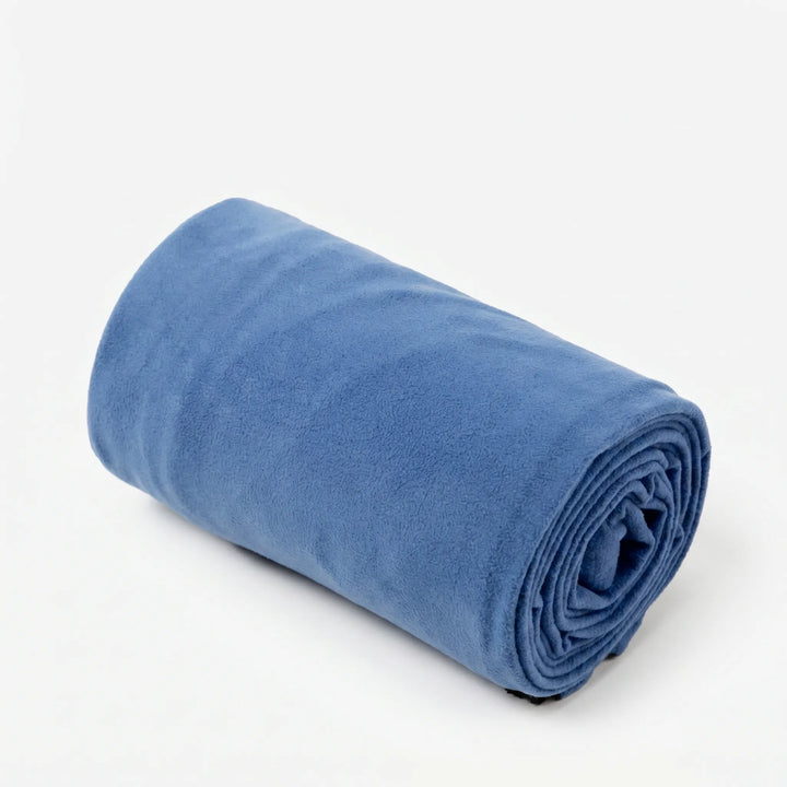 Fleece sleeping bag liner inside a sleeping bag, adding warmth & hygiene for camping, travel & backpacking.