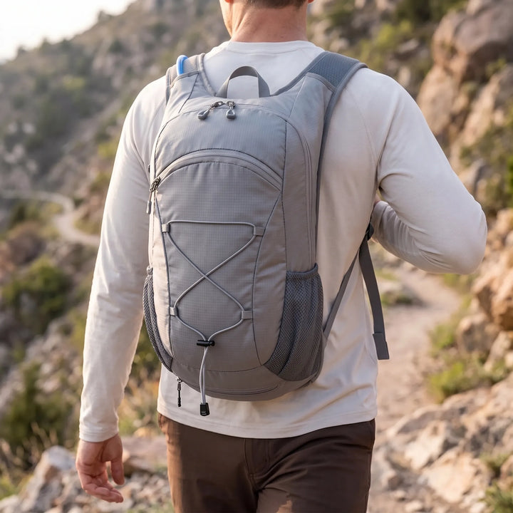 Unisex lightweight hiking backpack for outdoor trails & adventure. Durable nylon daypack.
