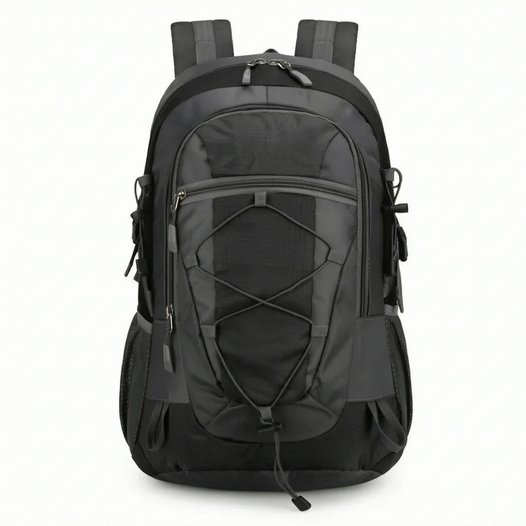 Hiker wearing a lightweight unisex hiking backpack on a scenic trail.