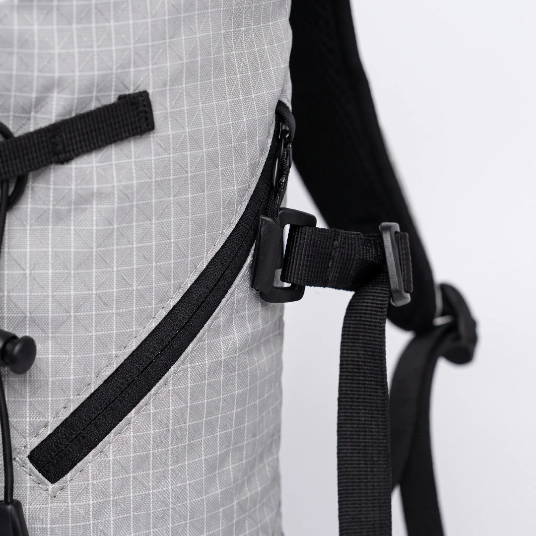 Back view of a lightweight hydration hiking pack, ergonomic design for comfortable unisex trail adventures & travel.