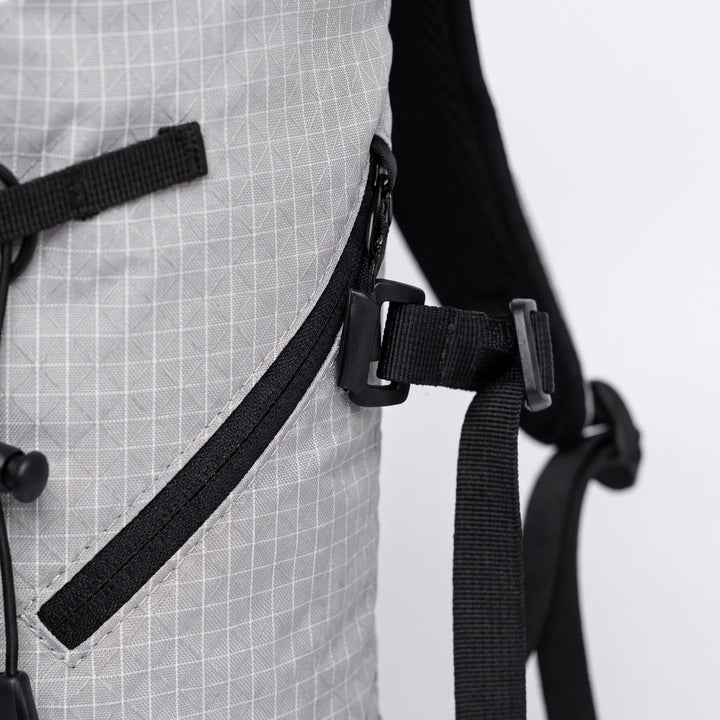 Back view of a lightweight hydration hiking pack, ergonomic design for comfortable unisex trail adventures & travel.