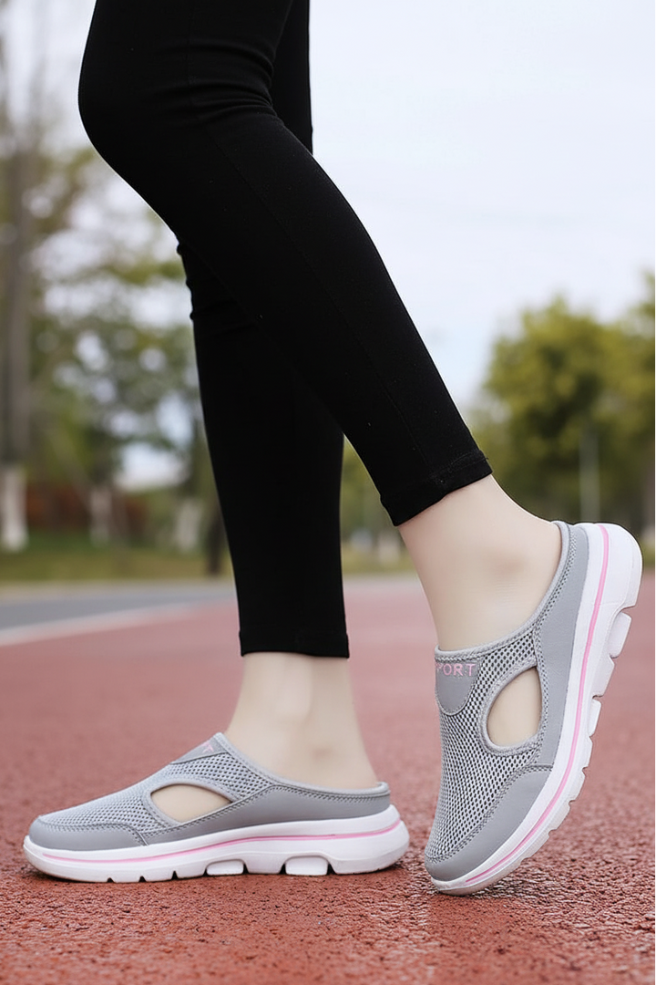 Stylish unisex orthopedic indoor slippers, perfect for all-day comfort & ergonomic support.