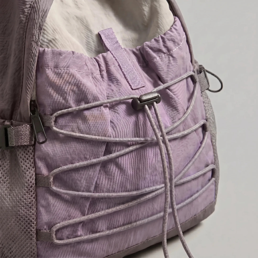 Adventure-ready unisex daypack; a lightweight nylon backpack for travel, hikes, and outdoor activities.