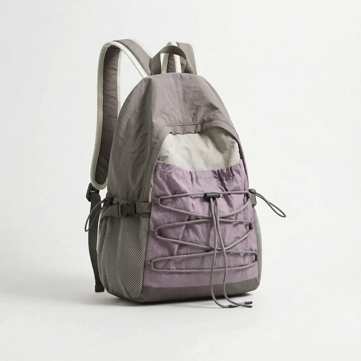 Nylon outdoor backpack, lightweight and unisex, a durable daypack for hiking, travel, and adventure.