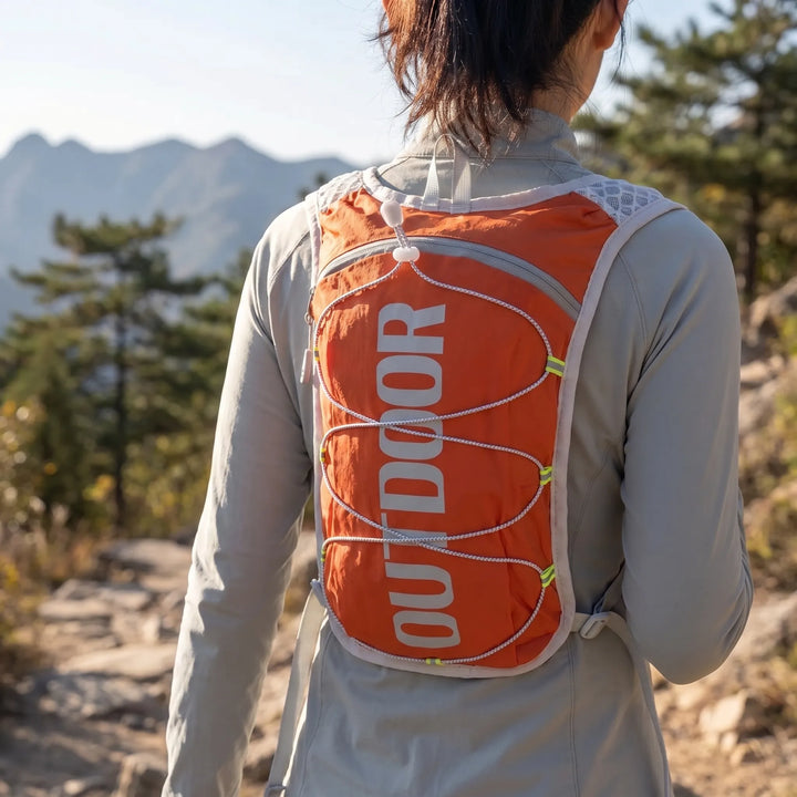 Unisex running vest with hydration capacity. Perfect lightweight activewear for trail, cycling, and hiking.