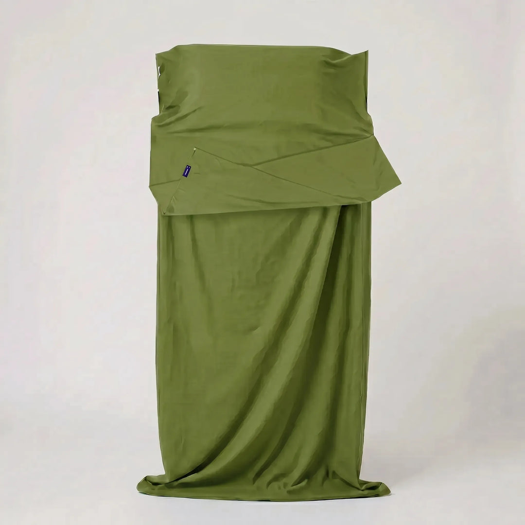 Sleep clean with this lightweight travel sleeping bag liner. Ideal for hostels, camping, and enhancing sleep hygiene.