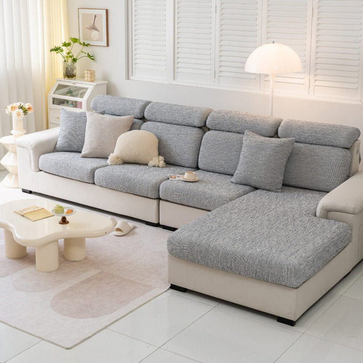 Close-up of the textured linen-blend stretch couch protector fabric, highlighting its elasticity and durability