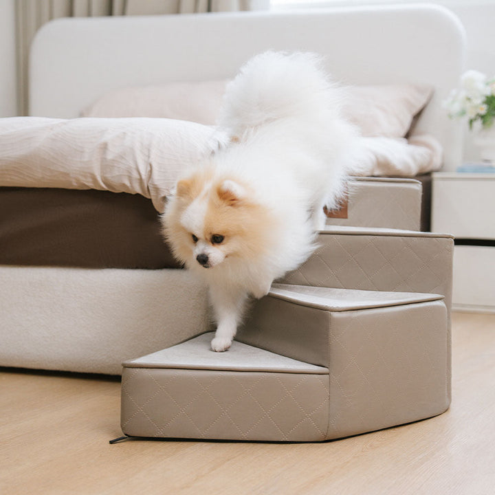 Faux leather pet stairs in a living room setting, elegant animal access