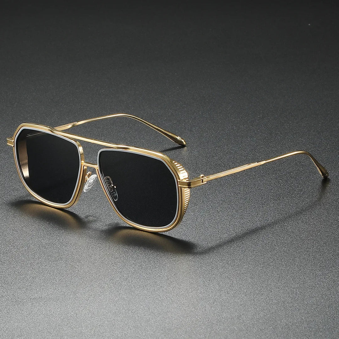 Unisex luxury shades with stylish gradient lenses, offering essential UV400 protection and a modern fashion accessory.