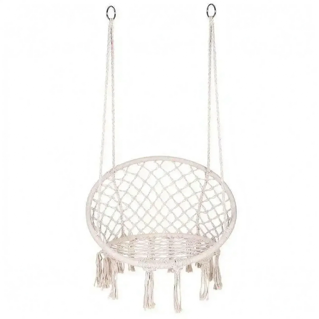 Full view of a unisex macrame hanging hammock chair, beautifully styled in an outdoor garden setting.