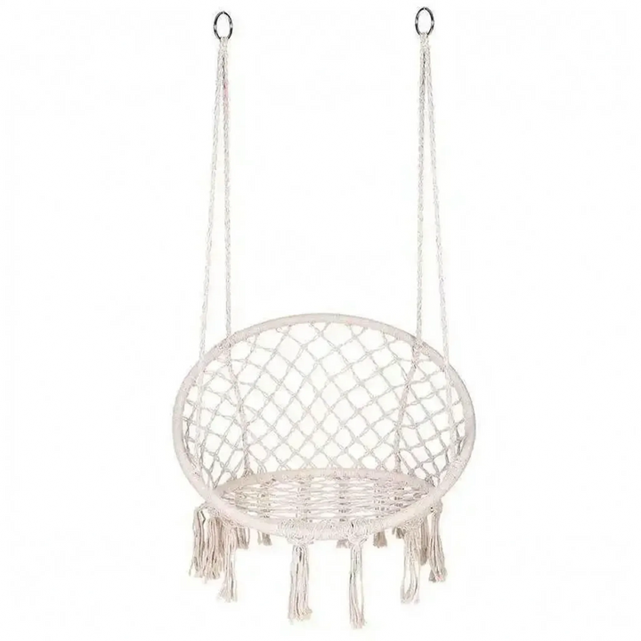 Full view of a unisex macrame hanging hammock chair, beautifully styled in an outdoor garden setting.