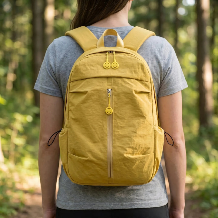 Unisex minimalist everyday backpack, black, versatile for work, school, travel, commuter.