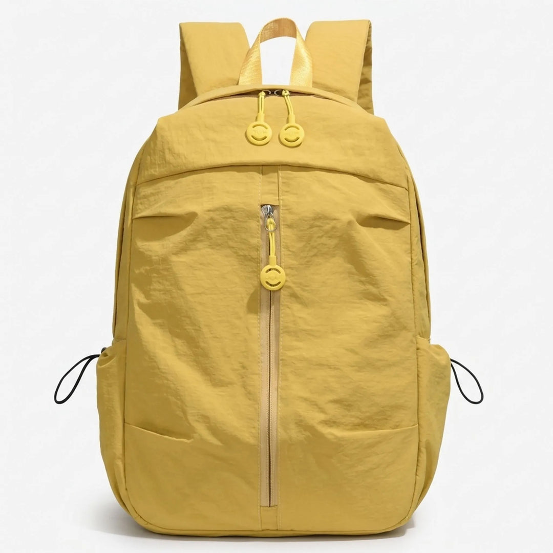Spacious everyday minimalist backpack, lightweight black nylon, ideal for school, work & travel.