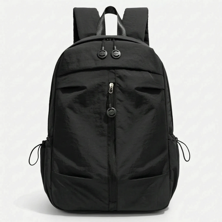 Black unisex minimalist commuter backpack, durable nylon, perfect for daily use & light travel.