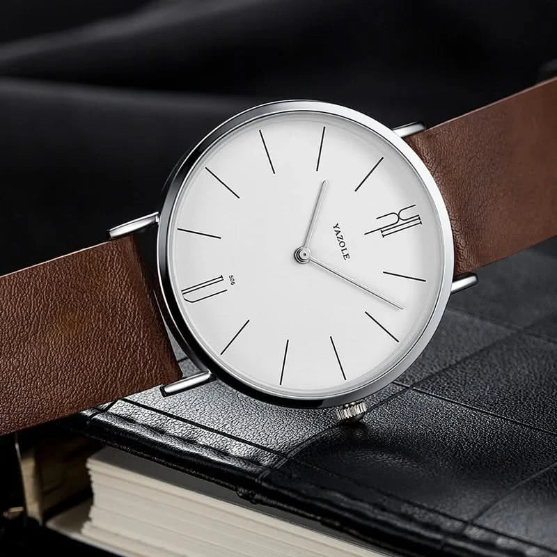 Sleek unisex watch showcasing a minimalist design and a premium leather strap. Ideal for a modern, sophisticated look.